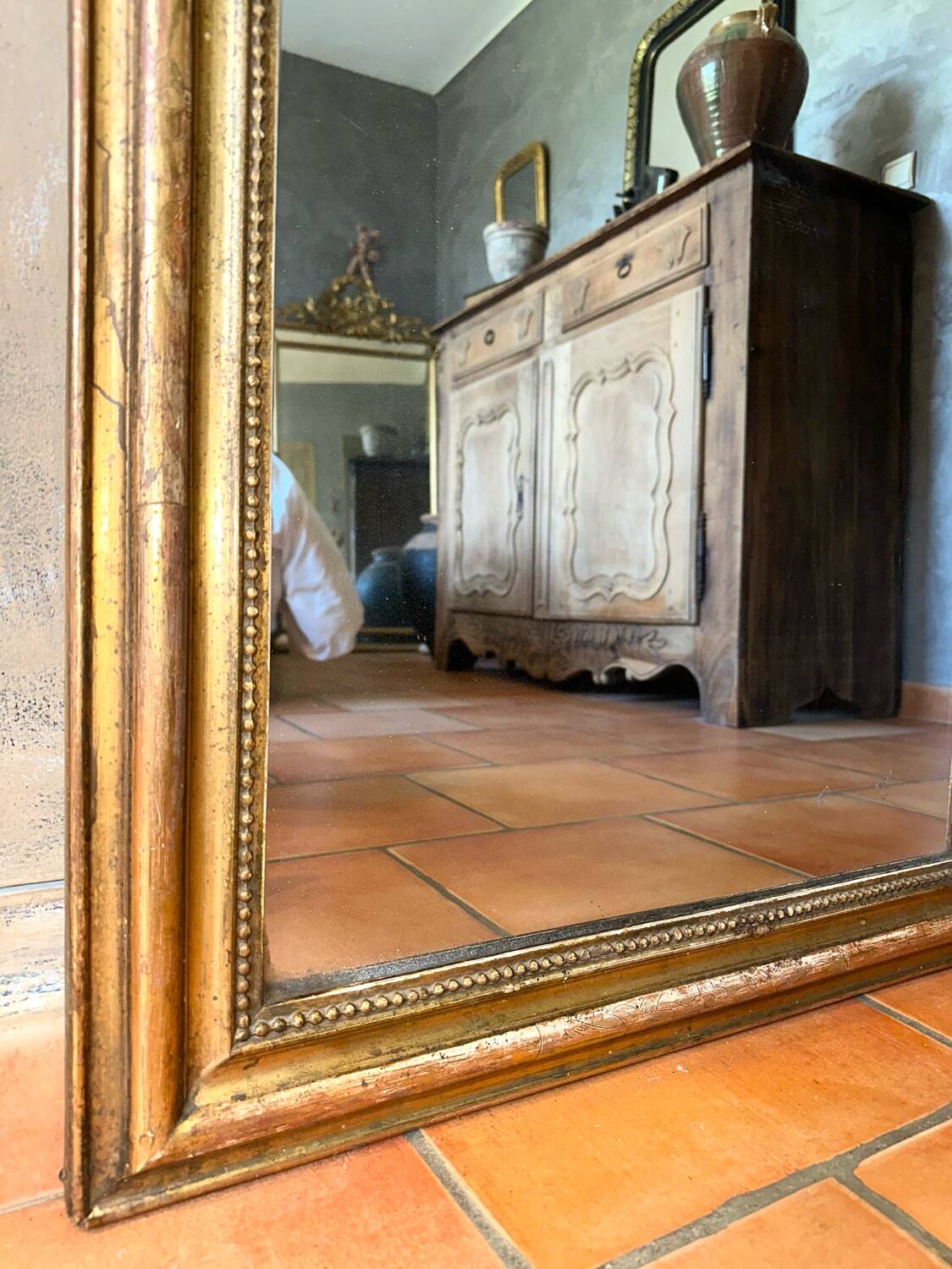 Antique gilded Louis-Philippe mirror, 19th century.