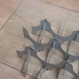 Minimalist sculptural coffee table in metal and glass