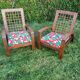 A pair of vintage rope and wood armchairs