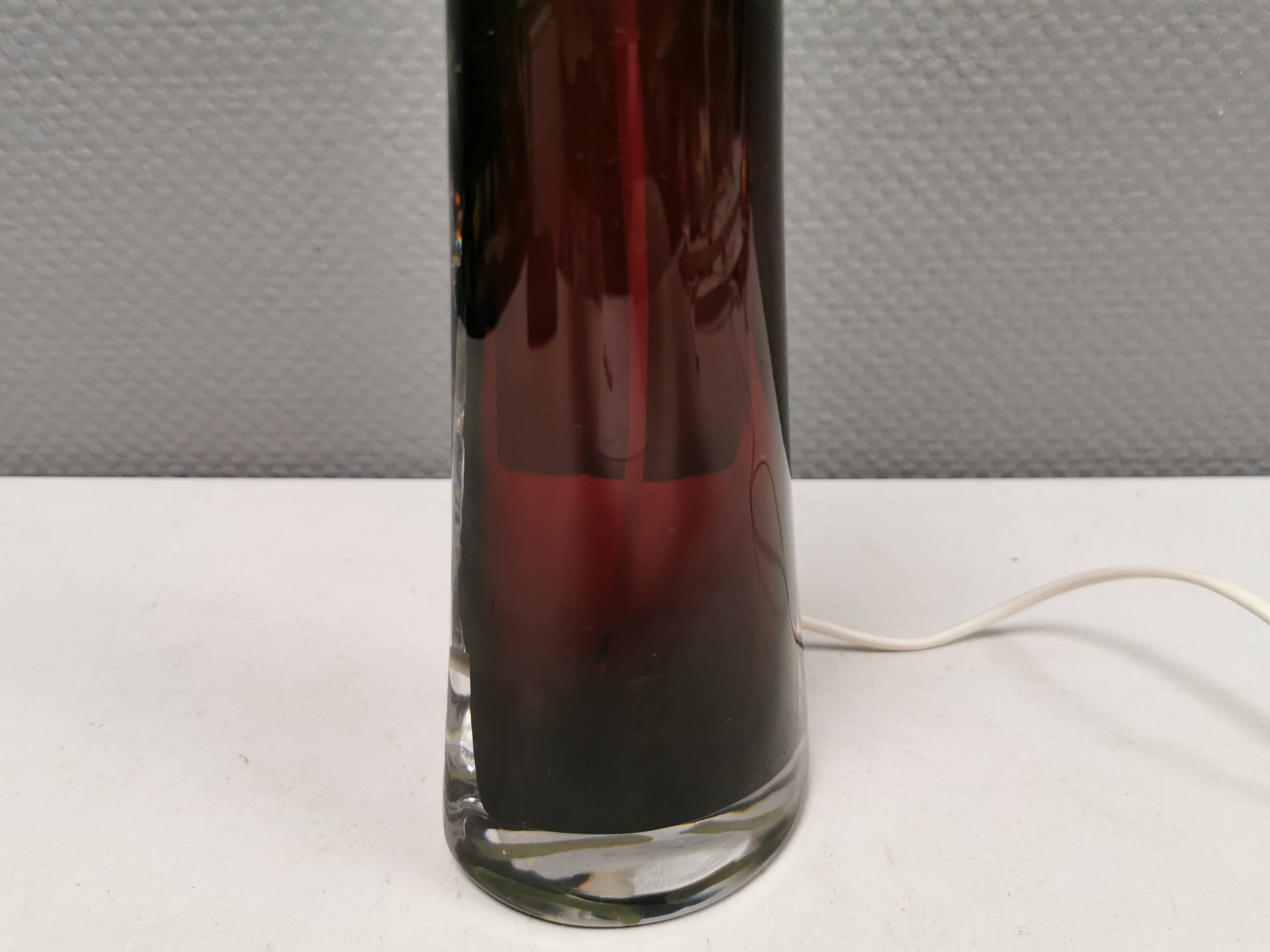 Table lamp by Carl Fagerlund for Orrefors Glassworks Sweden 1960s in translucent and deep red glass.
