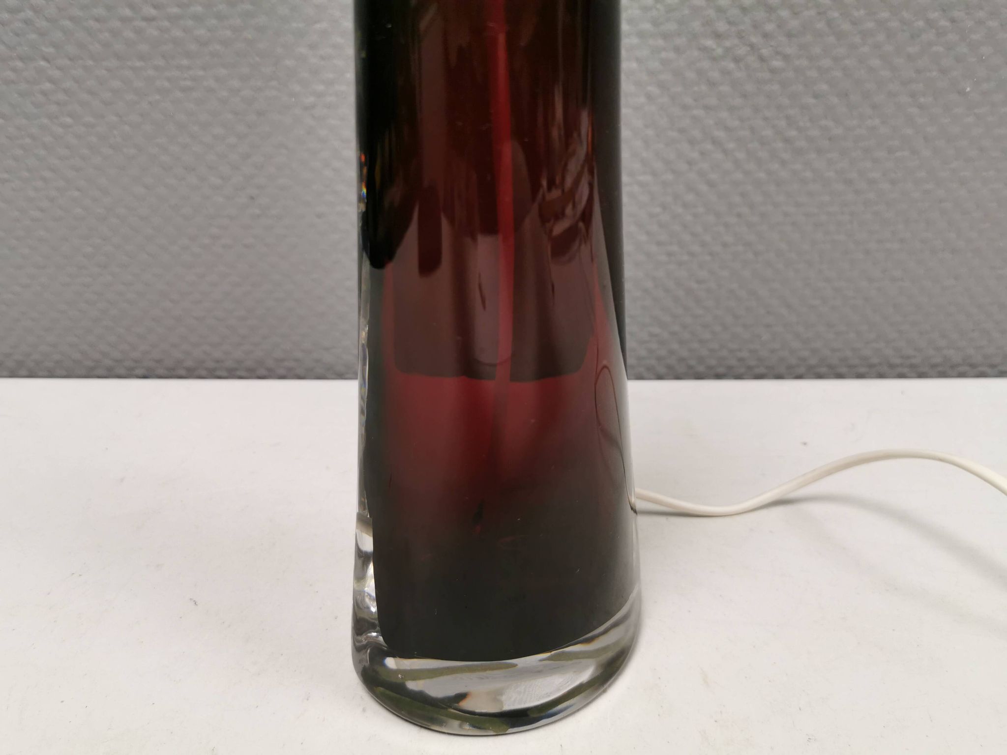 Table lamp by Carl Fagerlund for Orrefors Glassworks Sweden 1960s in translucent and deep red glass.