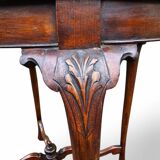 Antique oak side table with lion legs
