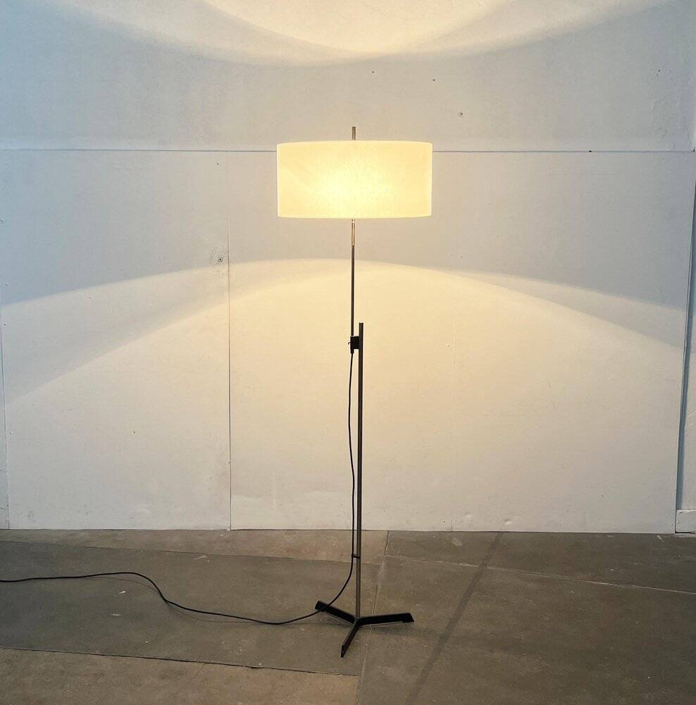 Mid-century German minimalist tripod floor lamp from the 1960s.