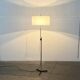 Mid-century German minimalist tripod floor lamp from the 1960s.