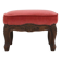 Baroque style foot stool in carved wood with coral velvet upholstery
