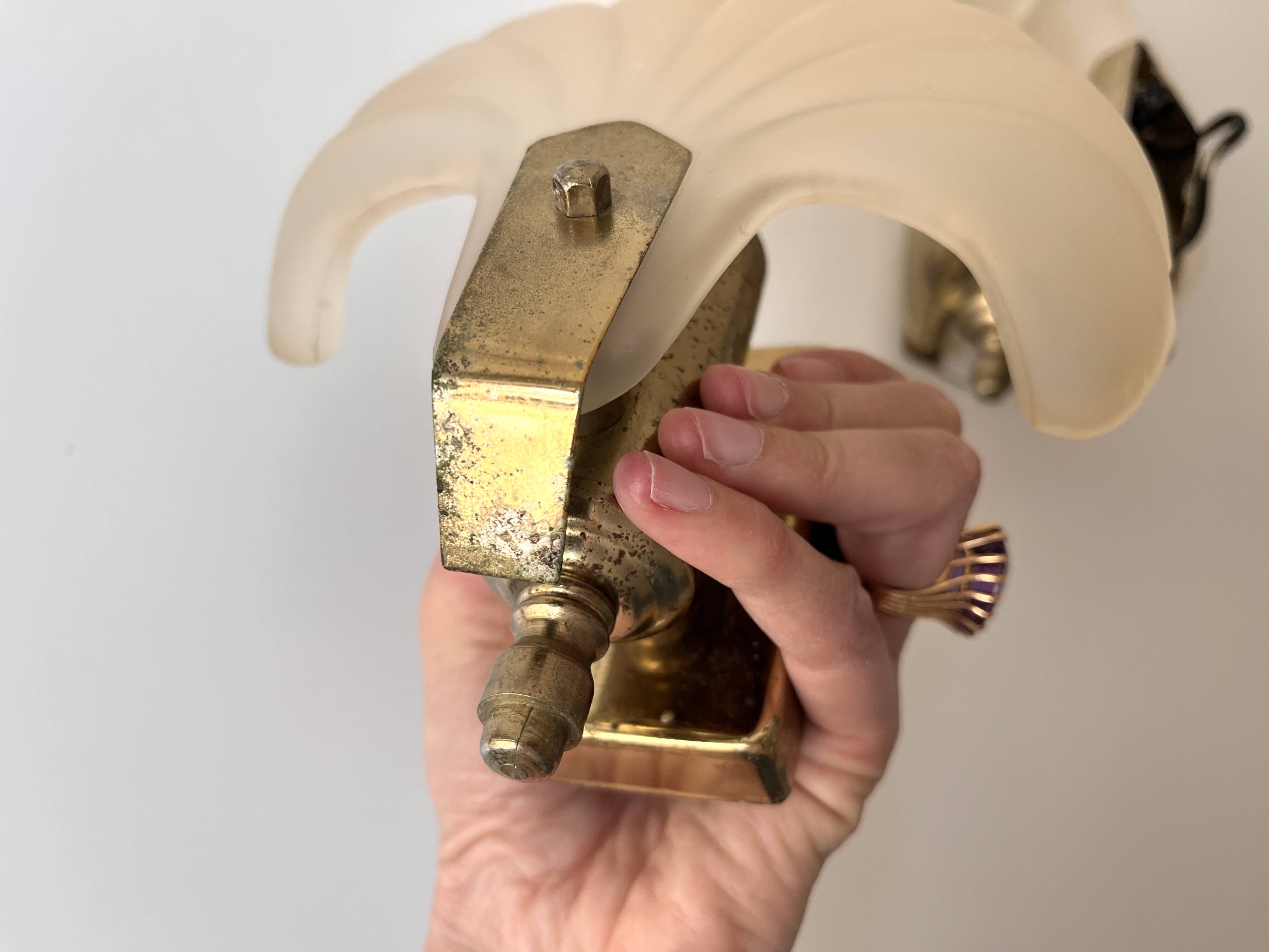 Pair of vintage shell glass wall lights, Art Deco style fixtures.