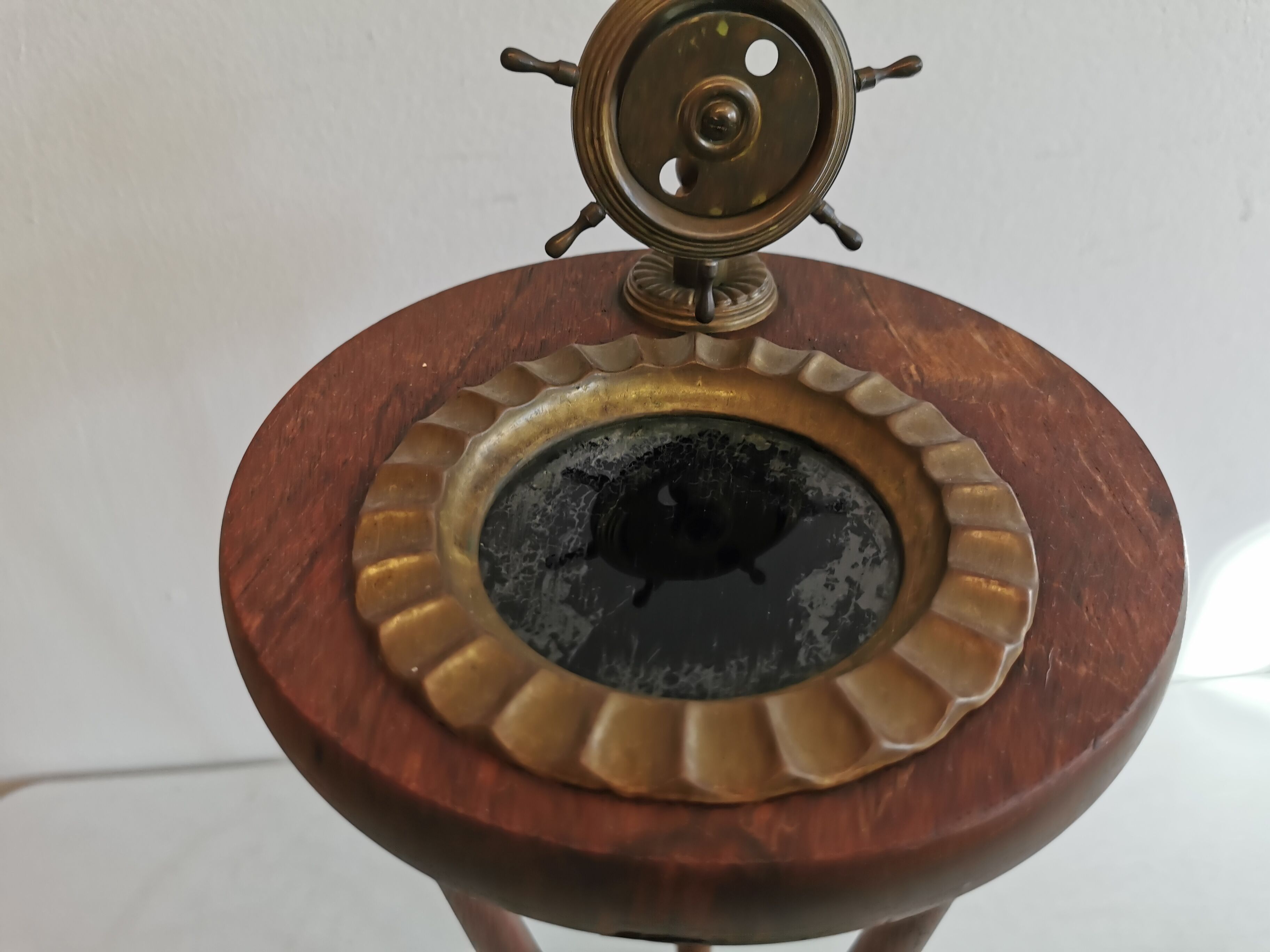 Older maritime floor ashtray on wooden base