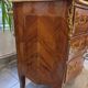 Louis XV style commode with marquetry and marble.