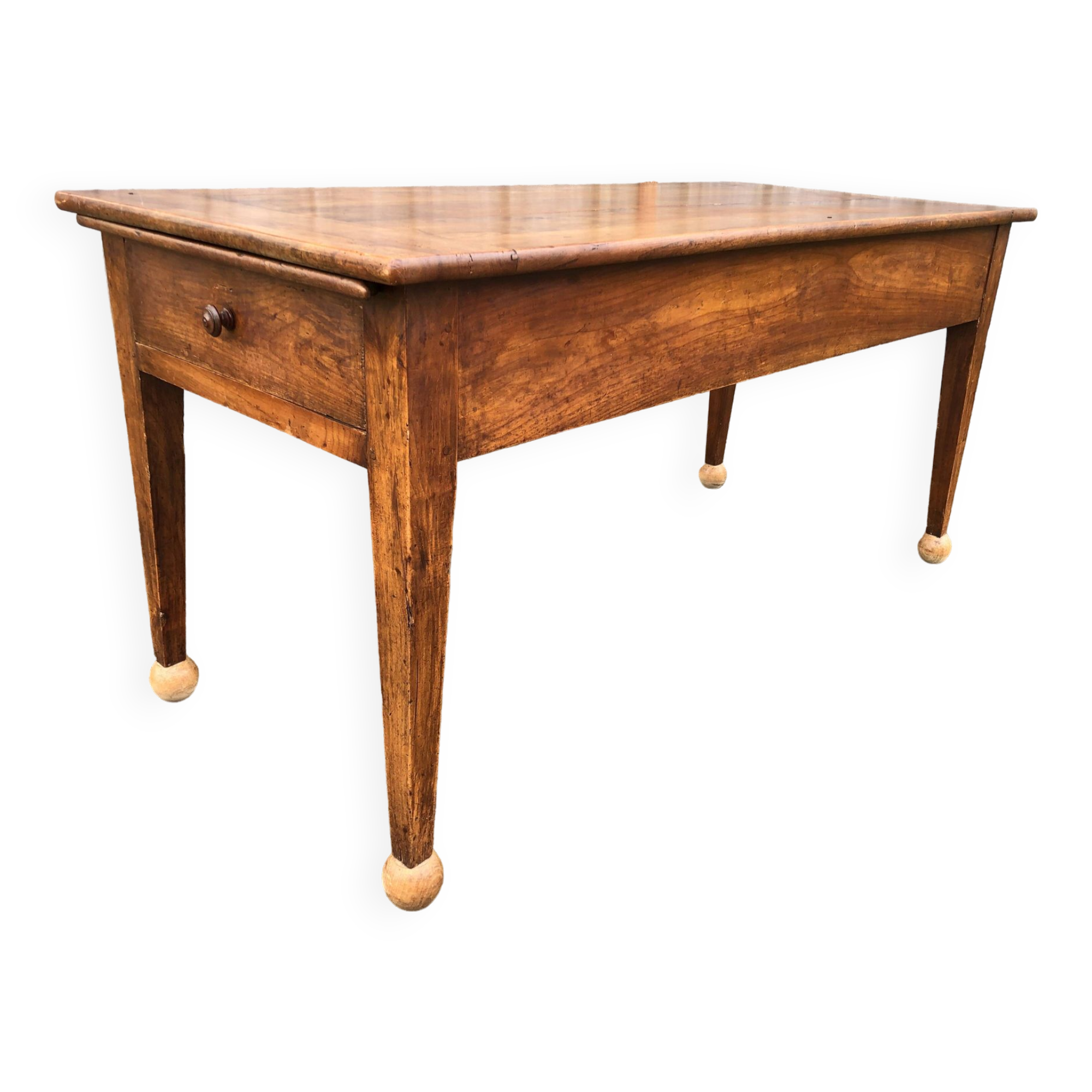 Antique solid cherry farmhouse table with 2 end drawers and 1 pull-out.