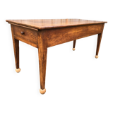Antique solid cherry farmhouse table with 2 end drawers and 1 pull-out.