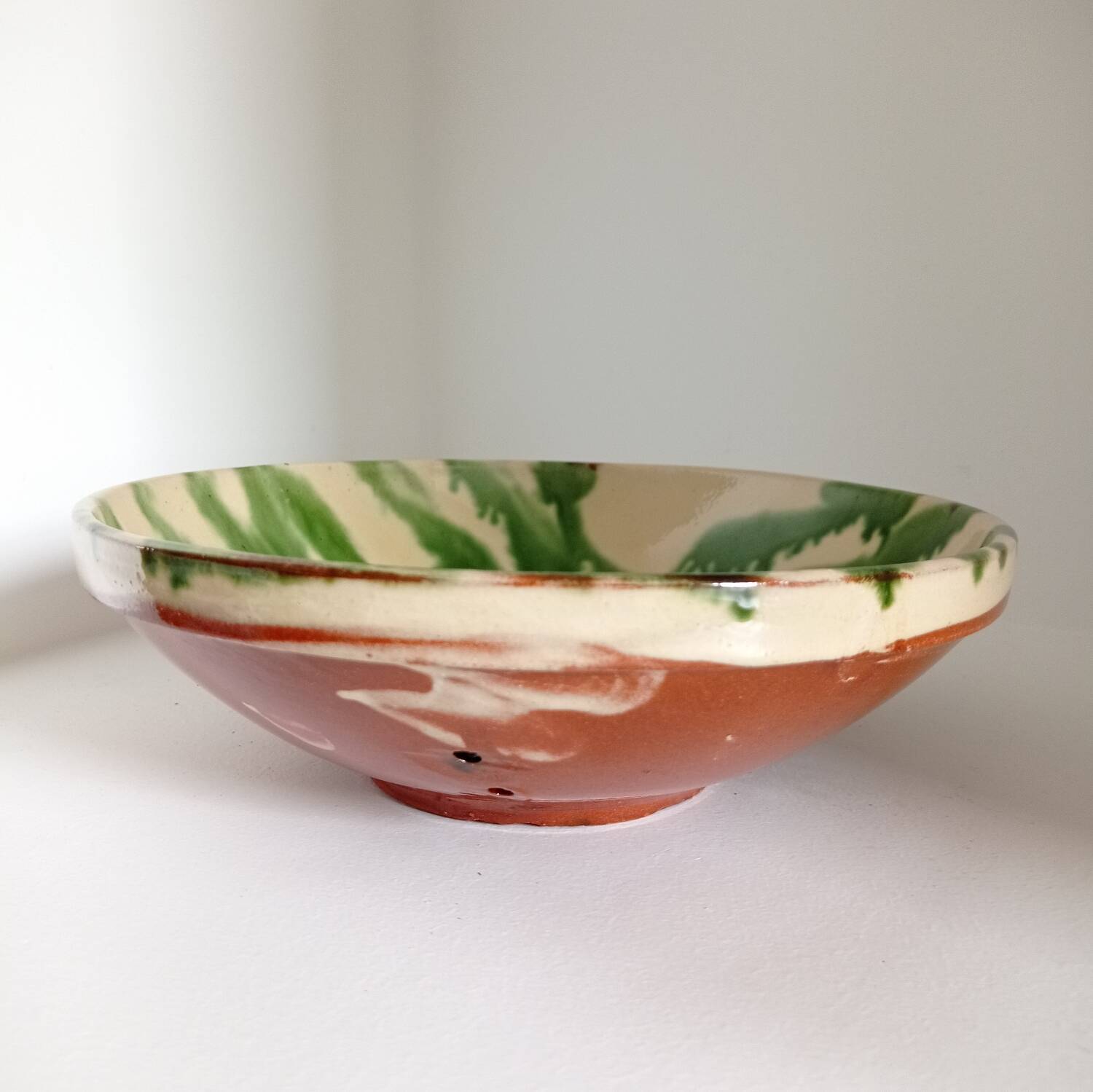 Ceramic fruit strainer