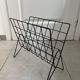Black metal wire magazine rack
