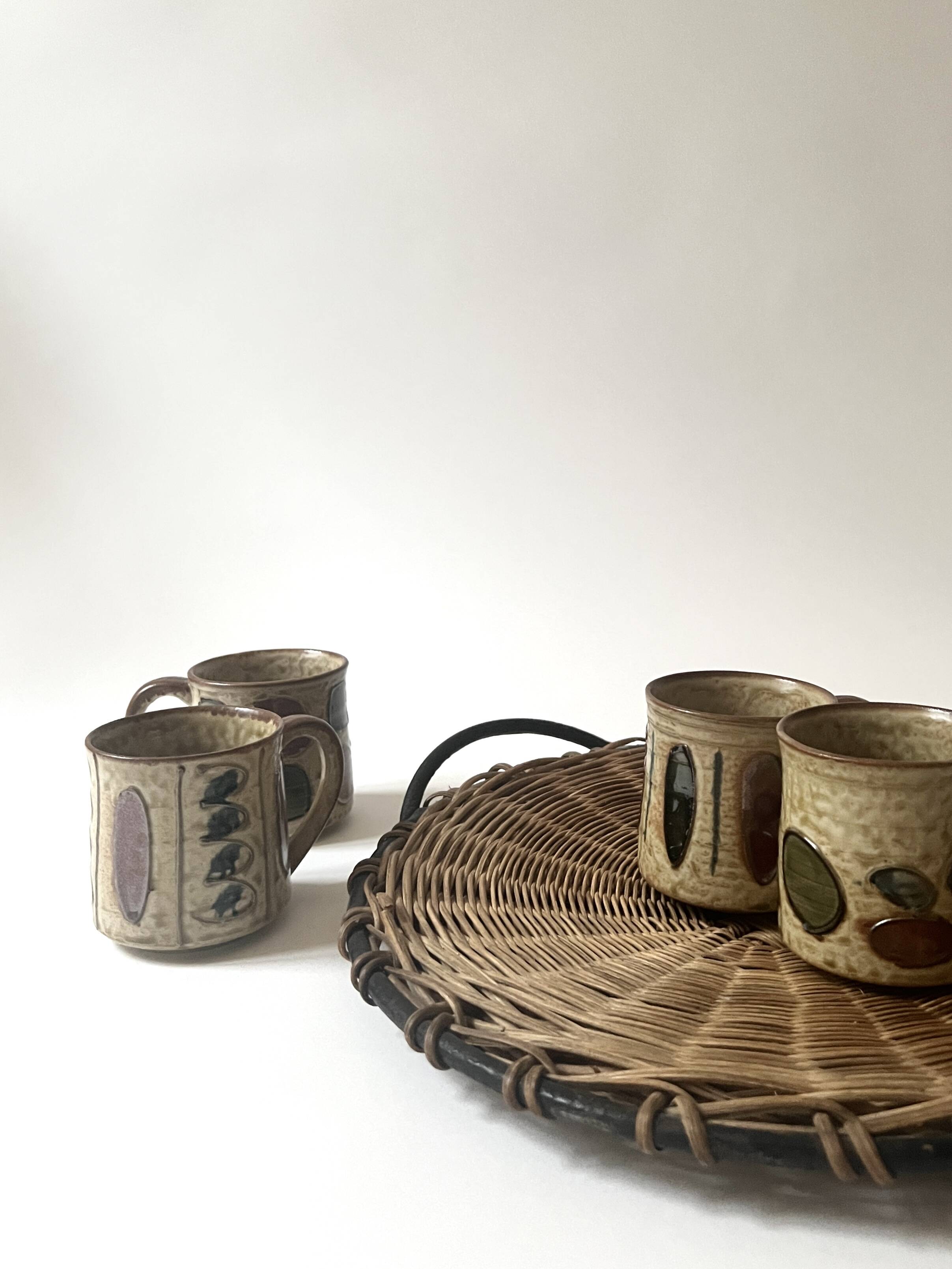 Set of 2 glazed ceramic coffee mugs from around 1970.