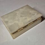 Rectangular light onyx jewellery box with brass trim, empty.