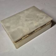 Rectangular light onyx jewellery box with brass trim, empty.