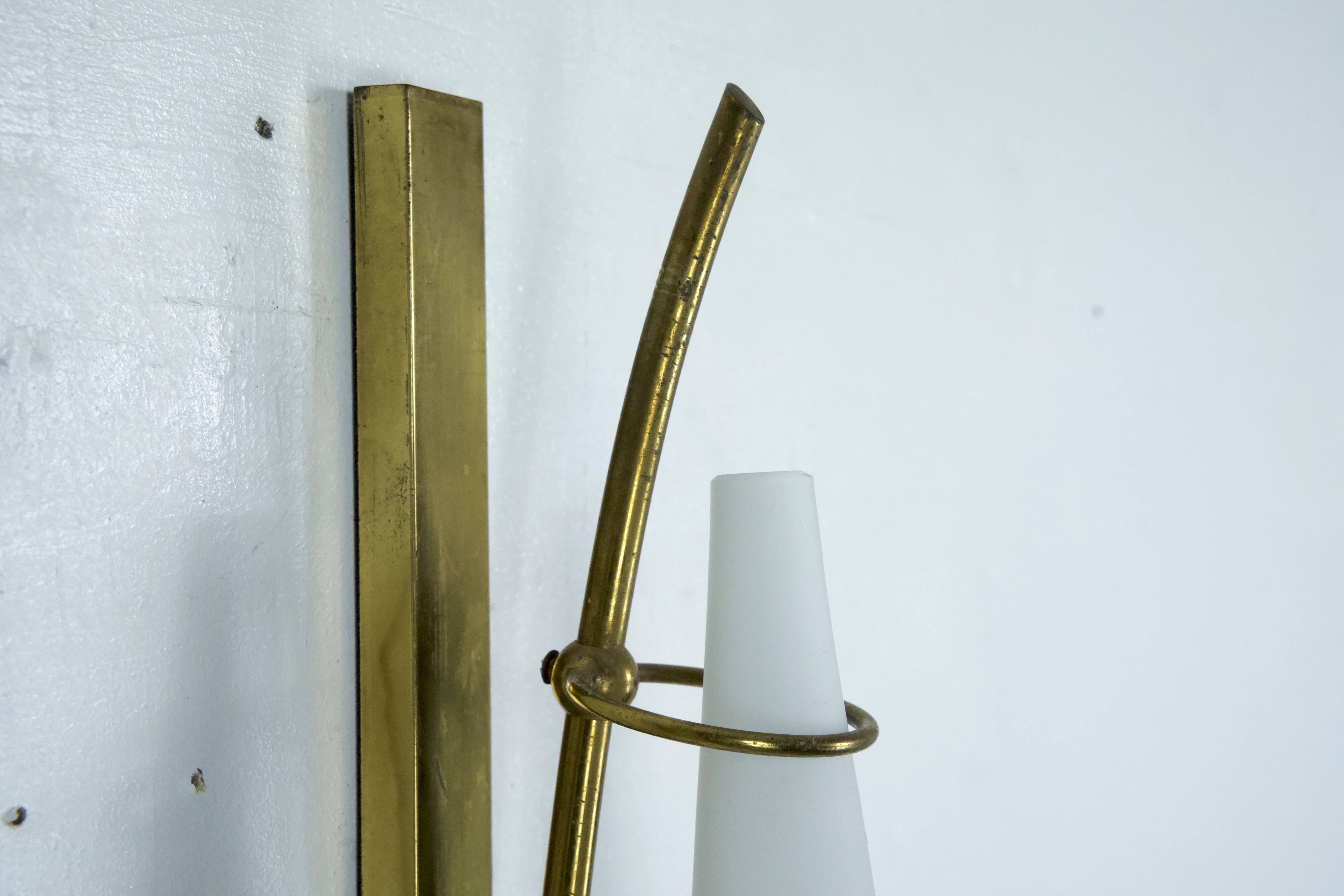 Set of three sconces in brass and triplex opaline glass. Italy 1950s