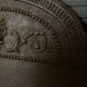 EIGHTEENTH CENTURY CAST IRON FIREPLACE PLATE REPRESENTING A WOMAN AND A WOLF