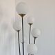 Mid Century Modern floor lamp in brass, marble, and opaline glass attributed to Stilnovo.