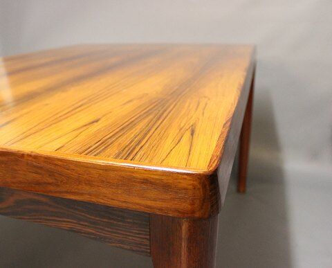 Teak dining table designed by Henning Kjaernulf and manufactured 60 years