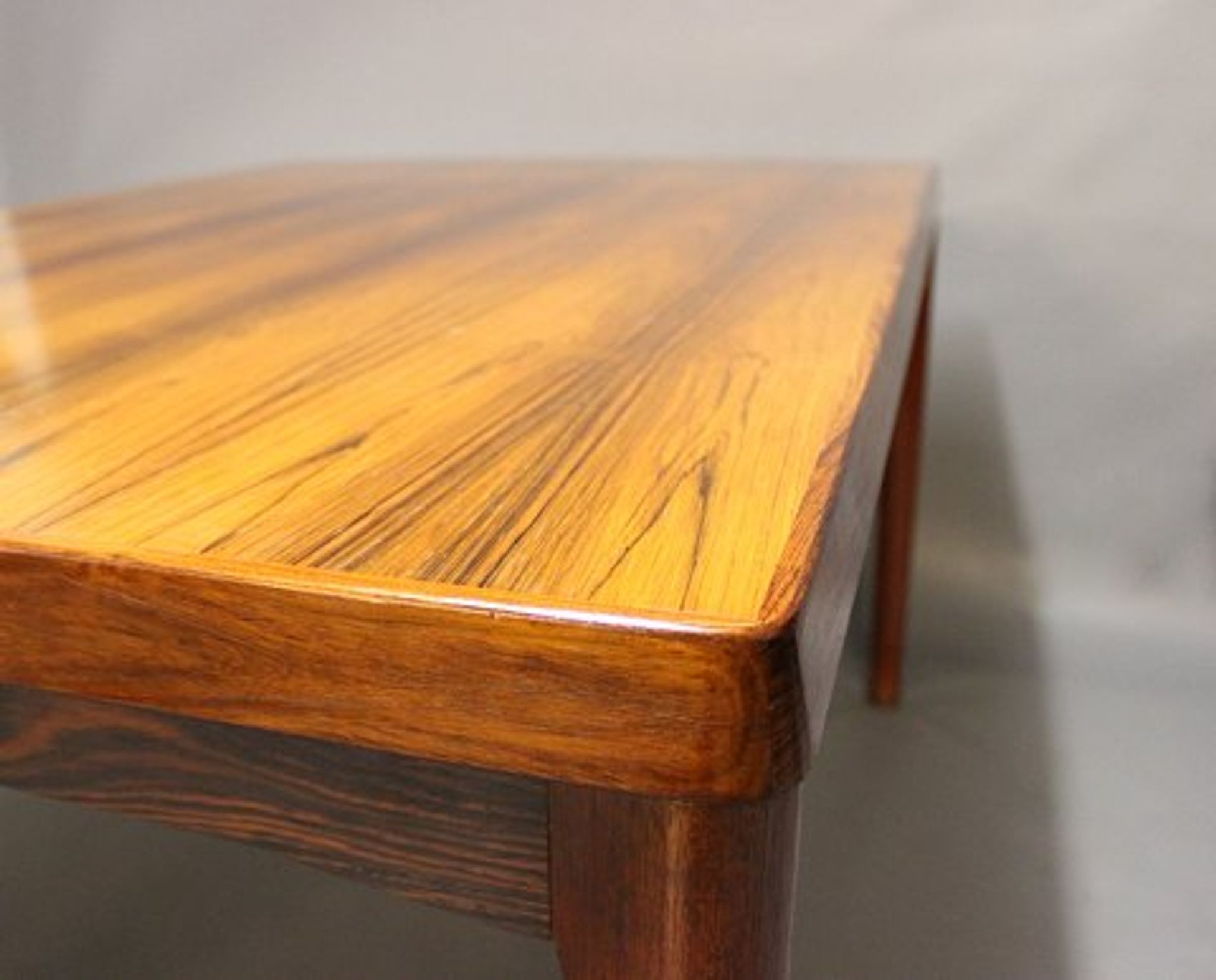 Teak dining table designed by Henning Kjaernulf and manufactured 60 years