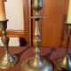 Trio of brass candlesticks
