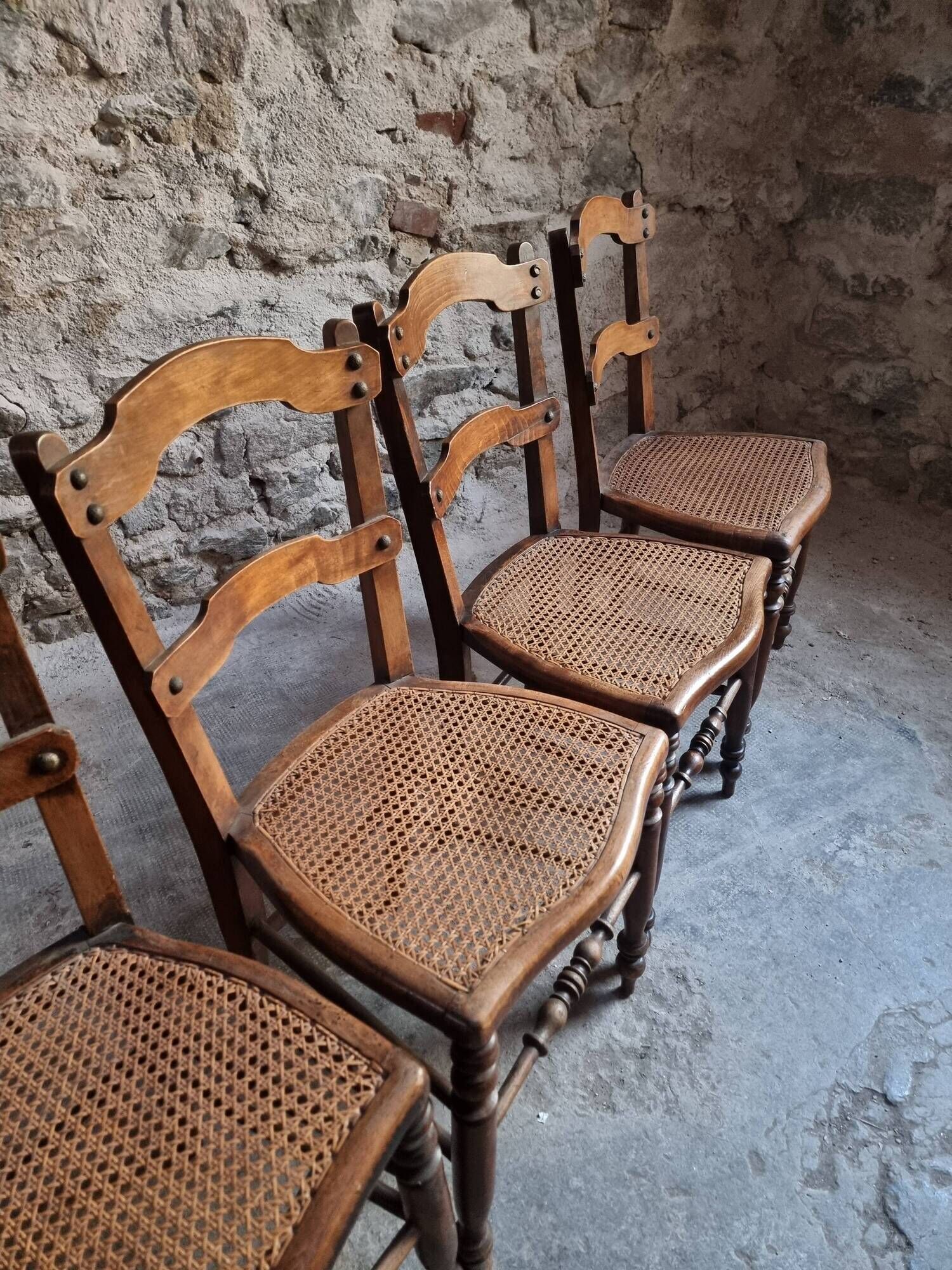Set of 4 antique dining chairs with caned seats, beech, France, circa 1900–1920.