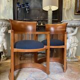 Pair of armchairs by Frank Lloyd Wright, Cassina edition