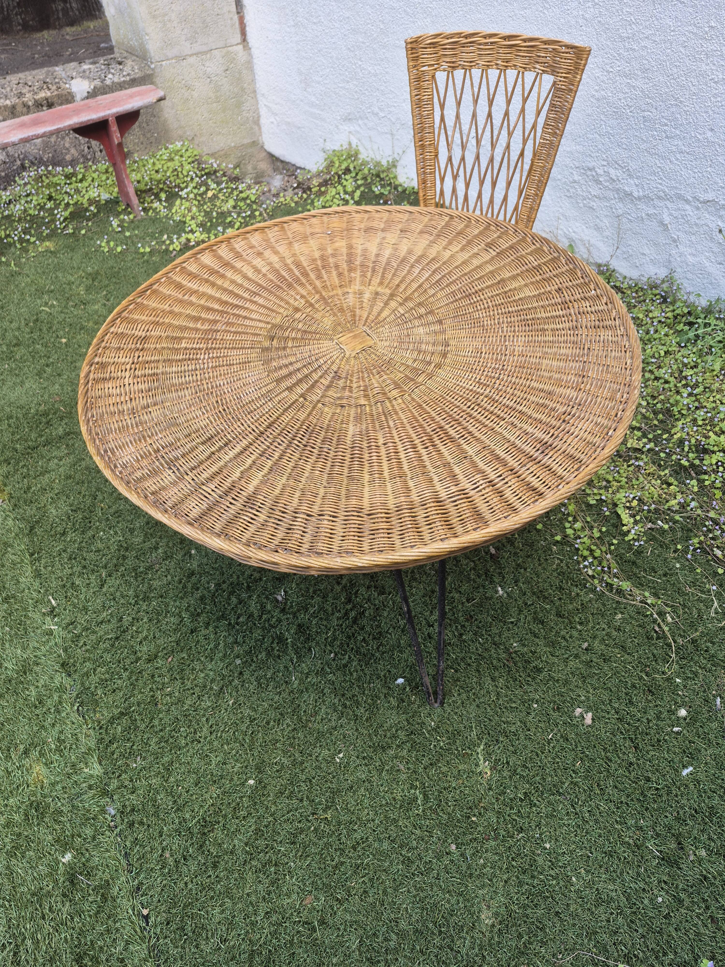 Wicker and black metal dining set