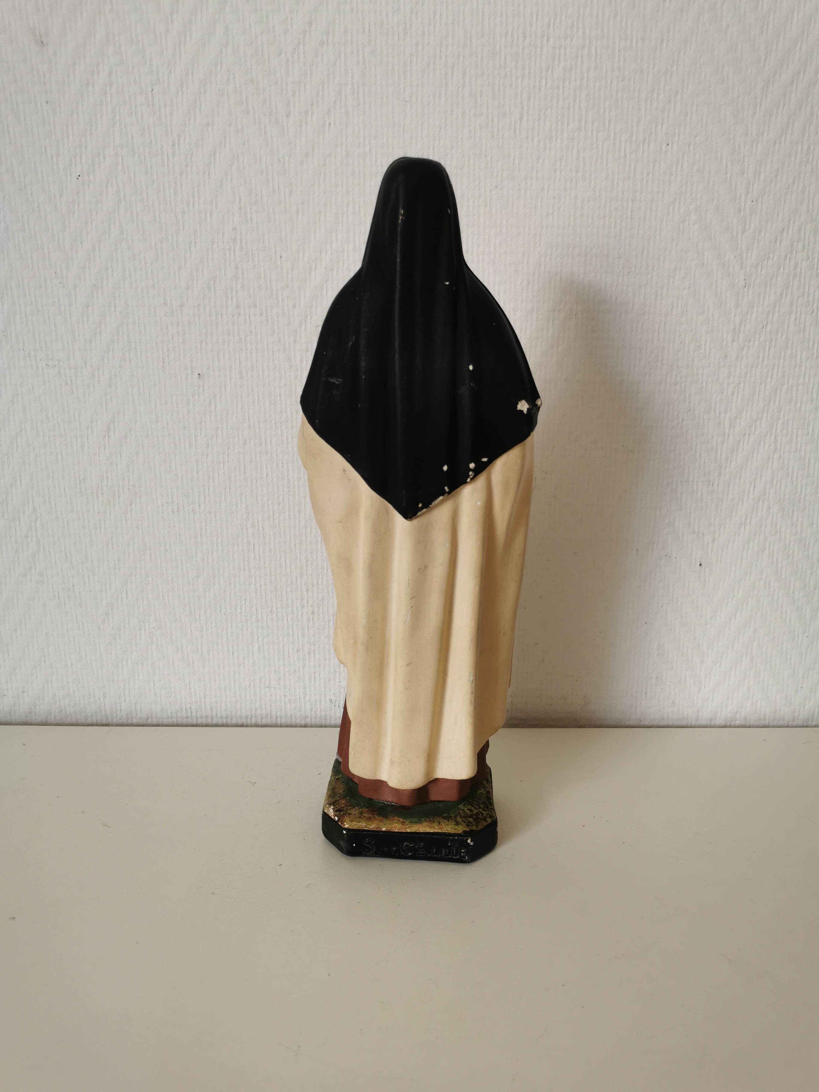 religious statue of Saint Therese of Lisieux in painted plaster