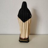 religious statue of Saint Therese of Lisieux in painted plaster