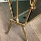 Brass magazine rack and blue-tinted glasses