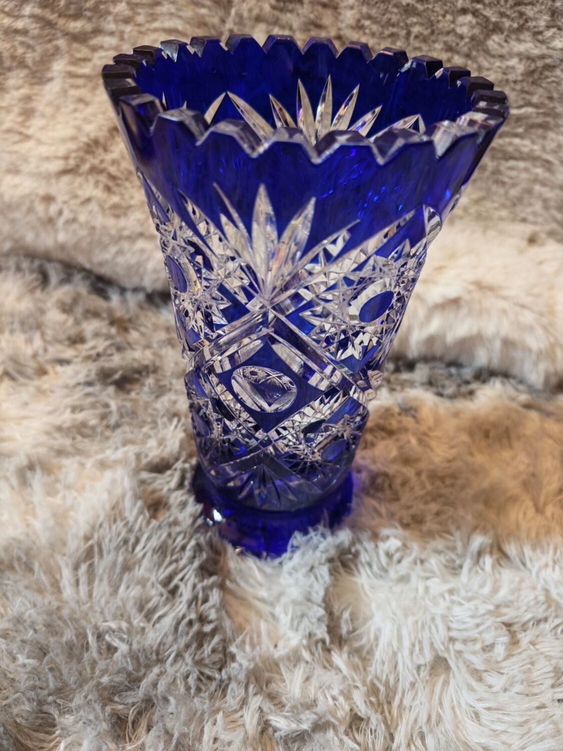 Bohemian vase in cut crystal with blue overlay.