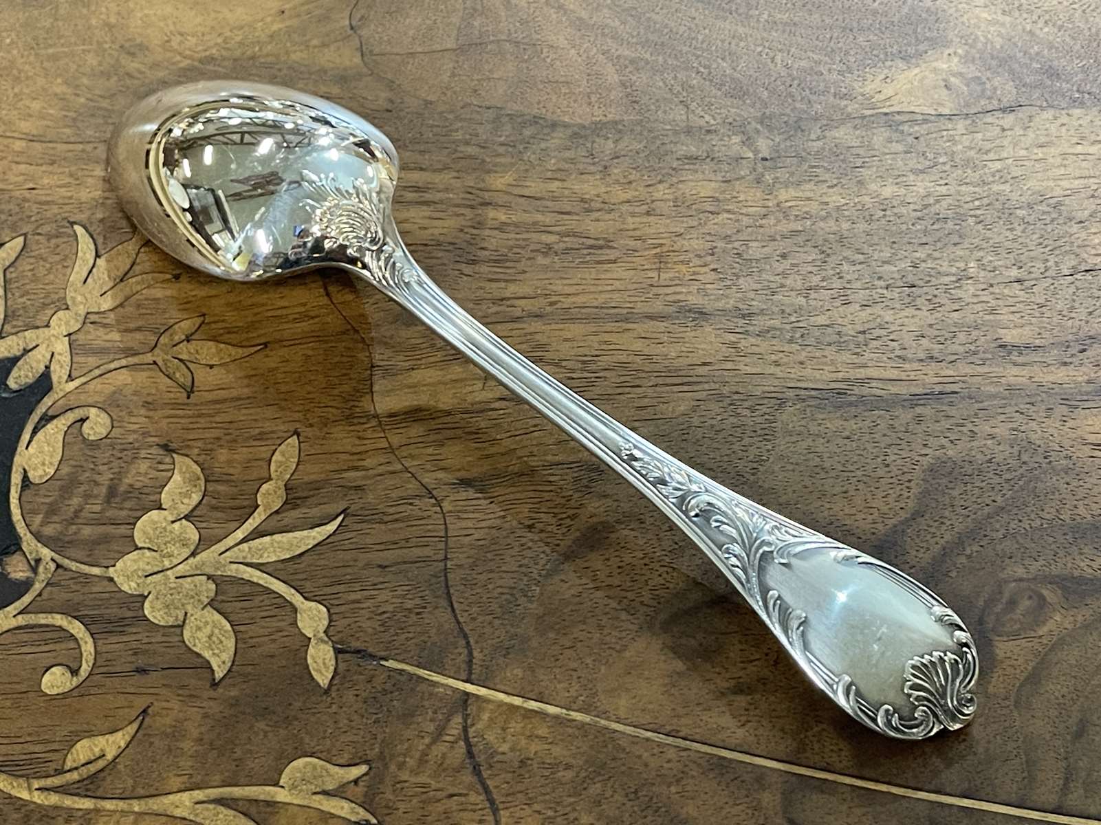 Series of 12 Christofle model Marly dessert spoons in silver metal