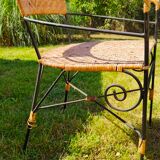 Garden table and wrought iron chair