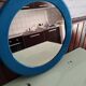 Vintage orange round mirror Syla 1970s