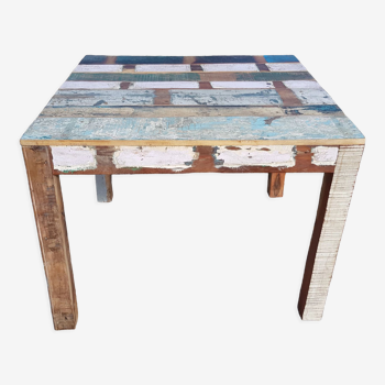 Square dining table in polychrome teak