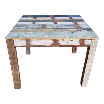 Square dining table in polychrome teak
