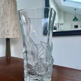 Large moulded glass vase with a floral design