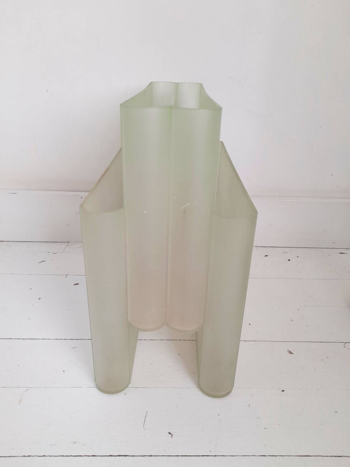 Stoppino magazine rack by Kartell