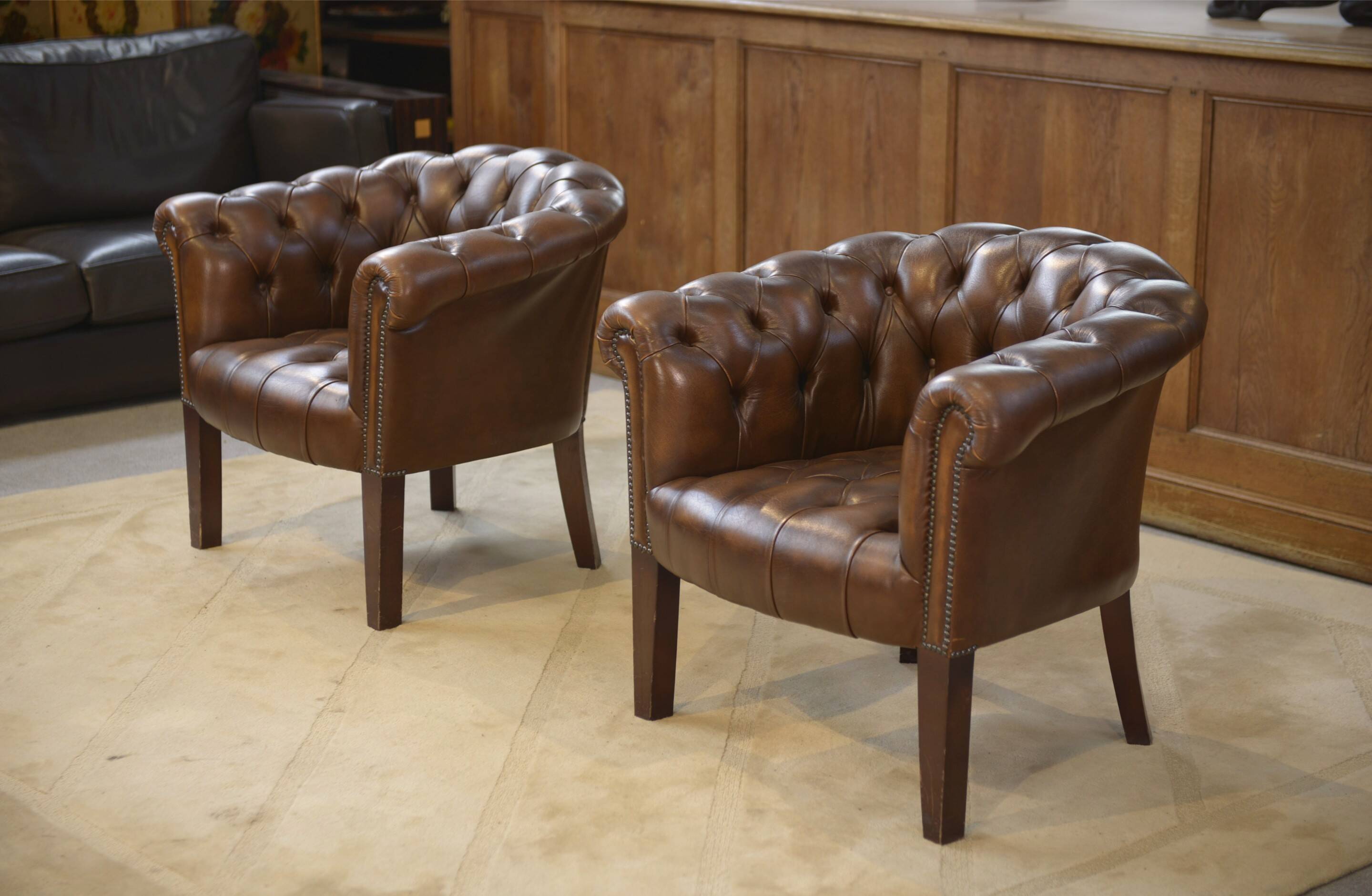 Pair of upholstered leather Club armchairs