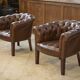 Pair of upholstered leather Club armchairs