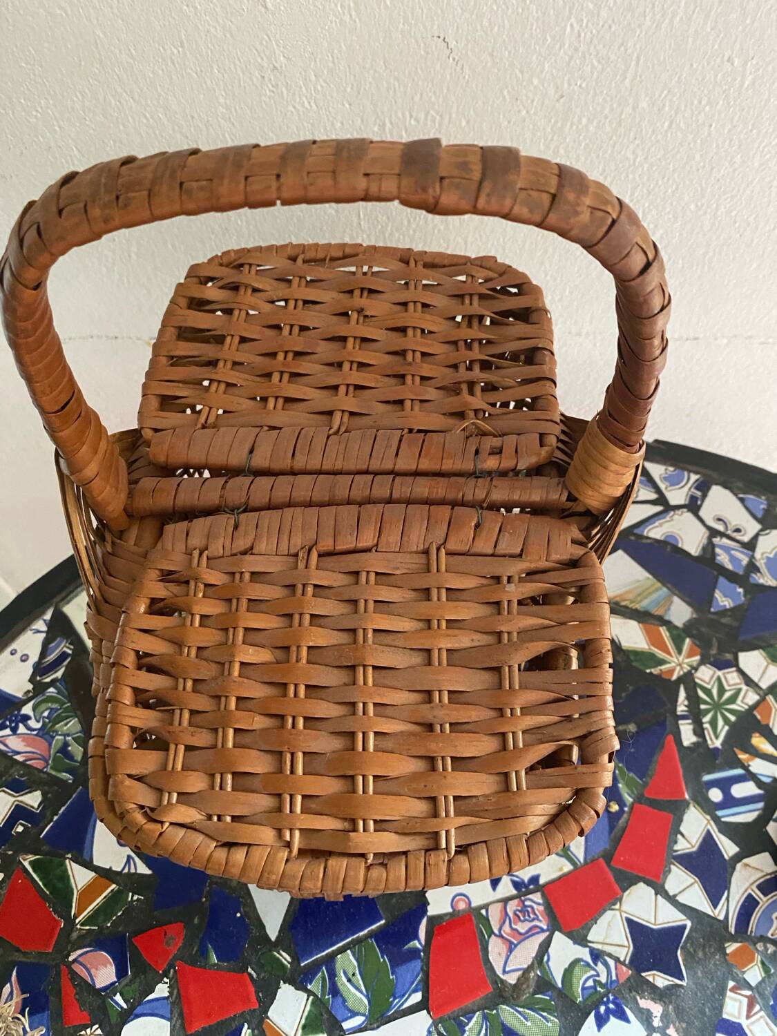 Brown woven vintage wicker basket with 2 lids.