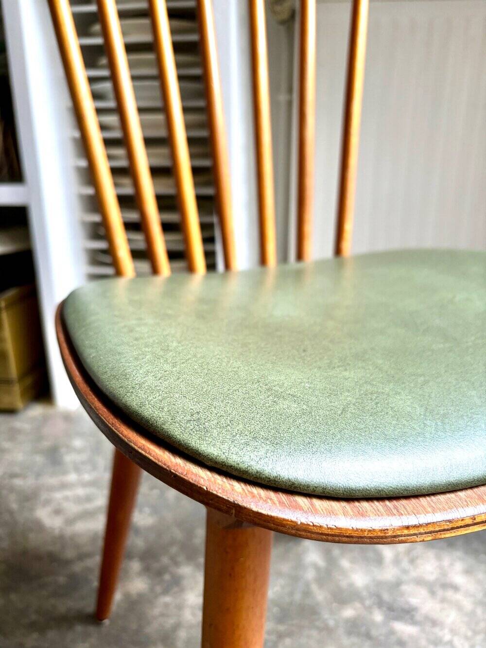 Baumann bistro chair in light wood and green skai, “Menuet” model