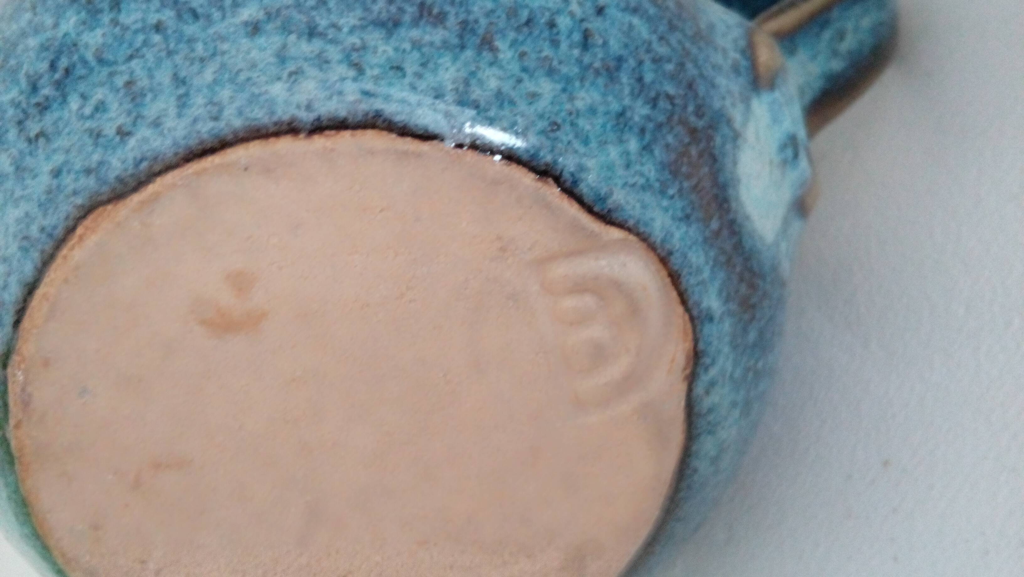 Pitcher in enamelled blue sandstone