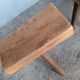 Pair of low stools in old patinated solid wood