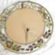 Miroir en métal doré rond, couronne de roses