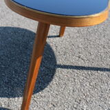 Bean coffee table with black glass top