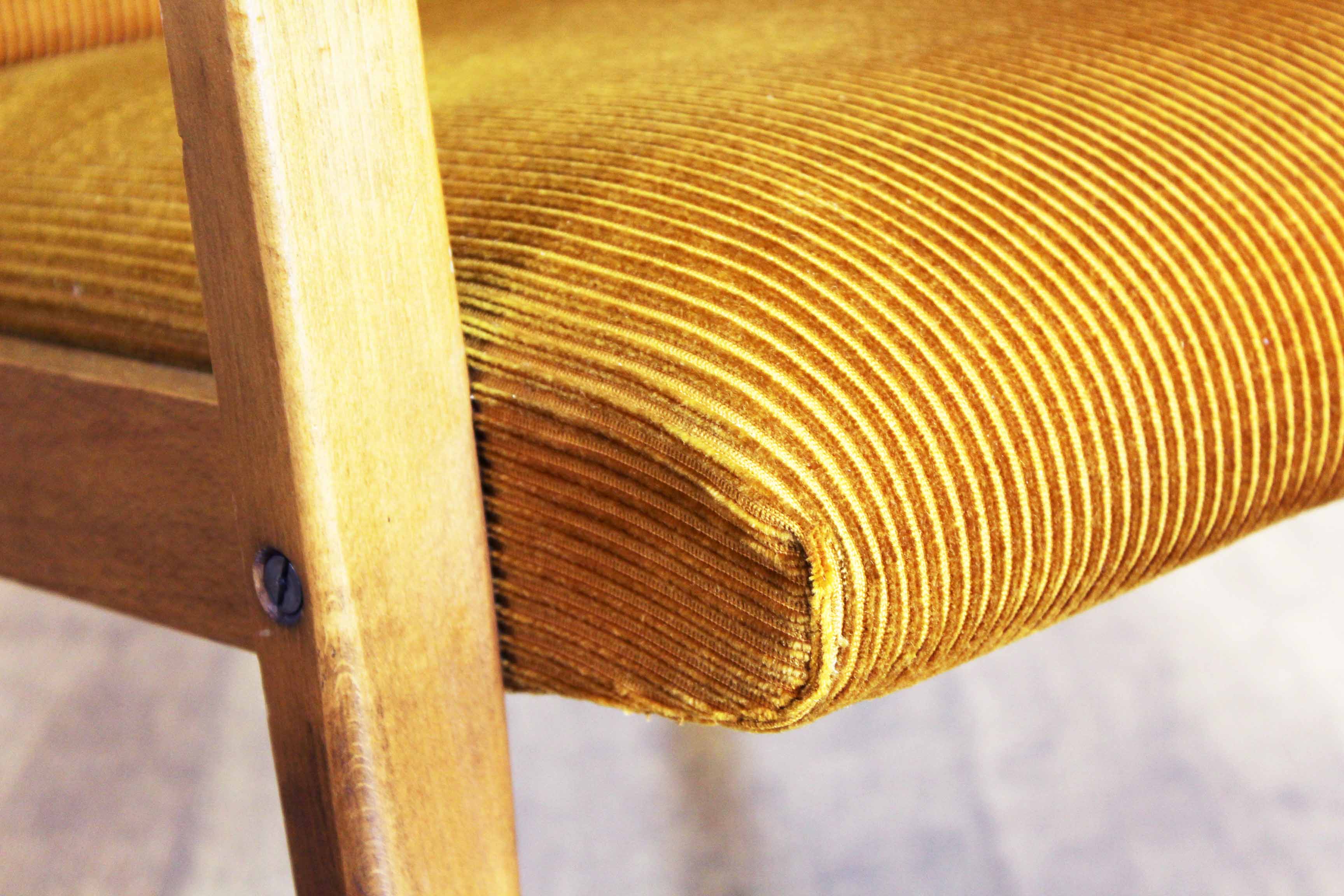 Scandinavian-designed chair in solid beech and mustard velvet