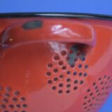 Vintage red enameled sheet metal colander