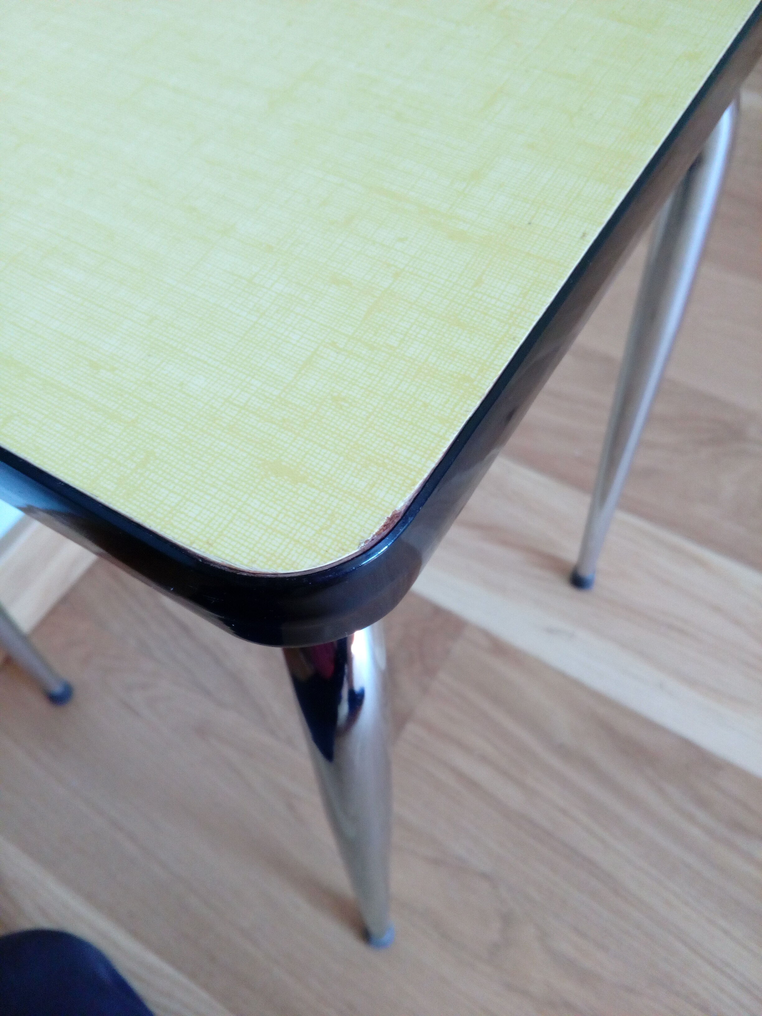 Yellow formica and chrome metal barstool